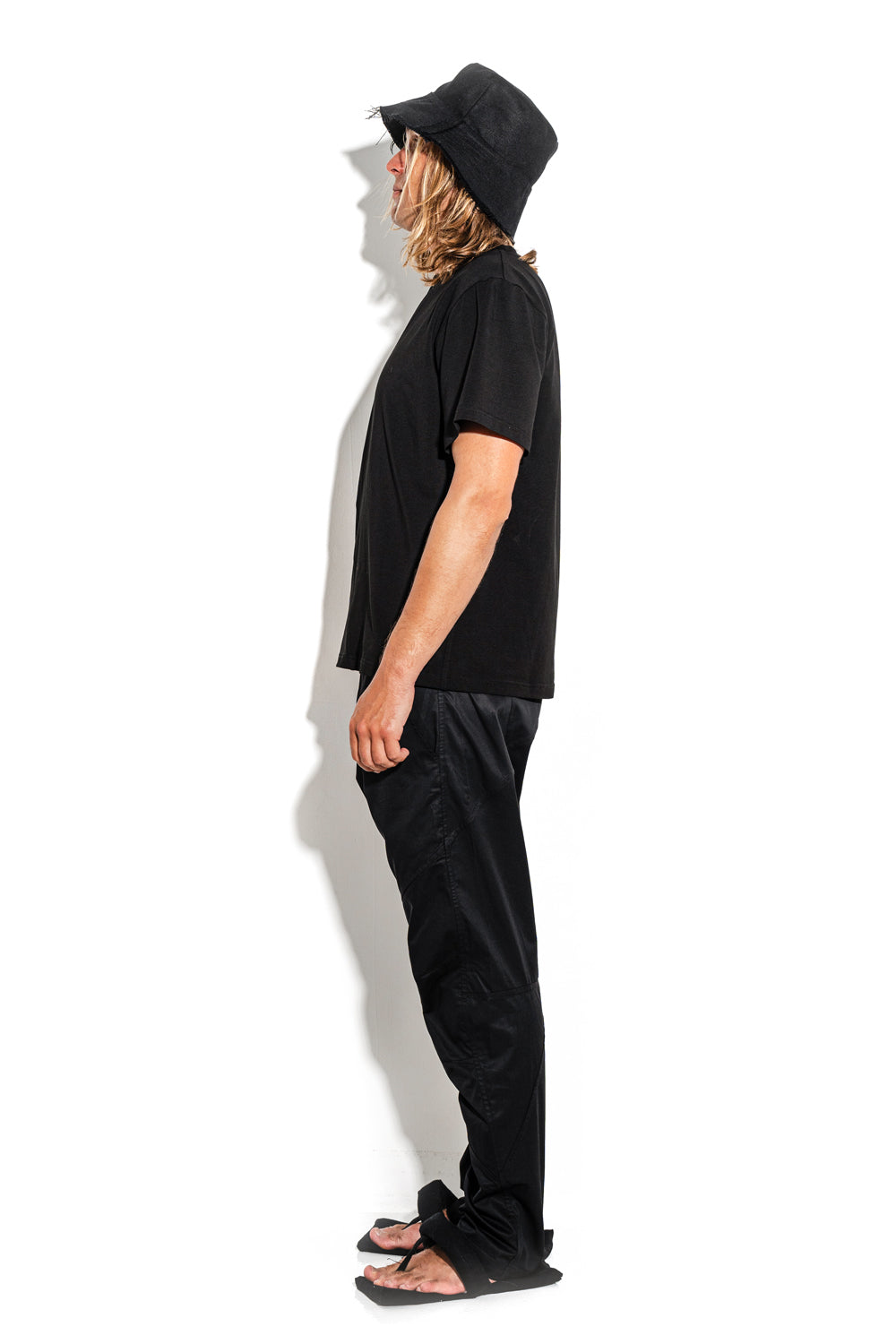Black T-shirt with a geometric seam